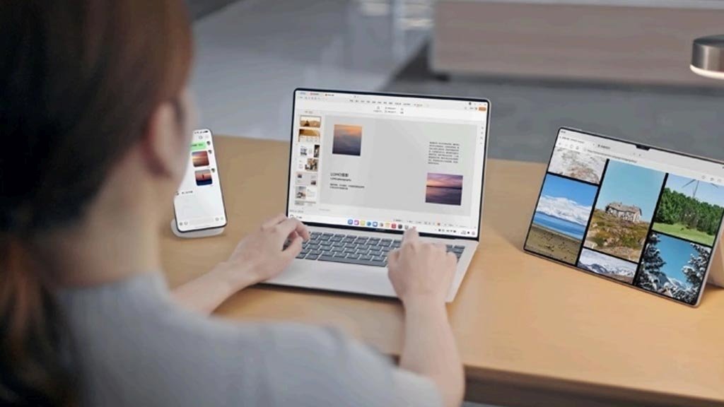 Huawei MateBook Pro con HarmonyOS PC trabajando junto a tablet y smartphone en un escritorio