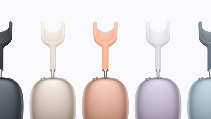 Cinco auriculares AirPods Max 2 de perfil mostrando los nuevos colores: Medianoche, Blanco Estrella, Naranja, Púrpura y Azul.